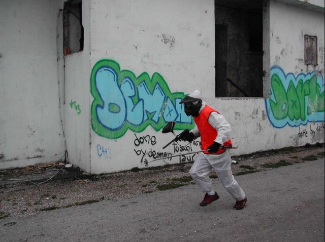  running through the urban stage of Paintball 